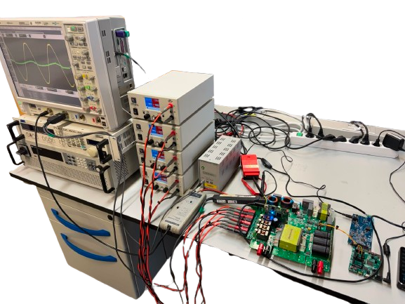 Nogara power-electronics lab bench: converter under test with oscilloscope and instrumentation